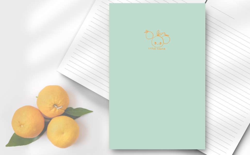 soft green cover of notebook, with 3 little oranges, one with a cute smiling face with the words below 'little cuntie'.