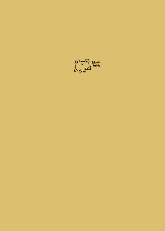 A yellow notebook with a simple black line drawing of a cute little frog on the cover with the words 'Brain frog'.