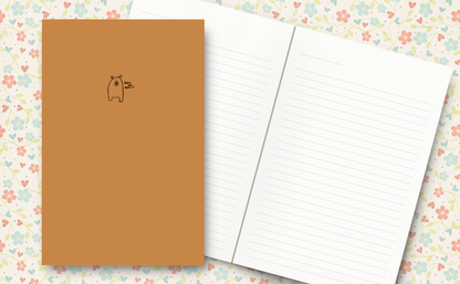 Sweet little bear with words 'grin and bear it' on a soft brown cover. Inside lined pages.